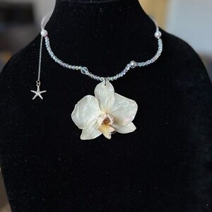 Elegant Pearl and Orchid Necklace